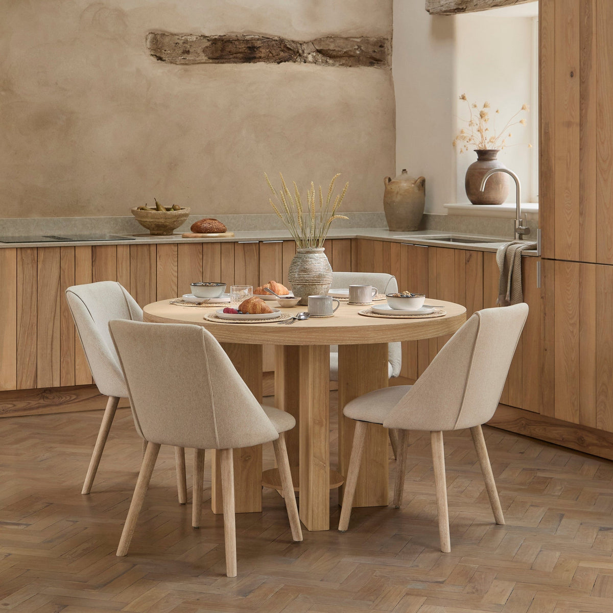 Marlon Whitewash Oak Round Dining Table Set - 4 Seater - Freya Sand Dining Chairs - Whitewash Oak Legs